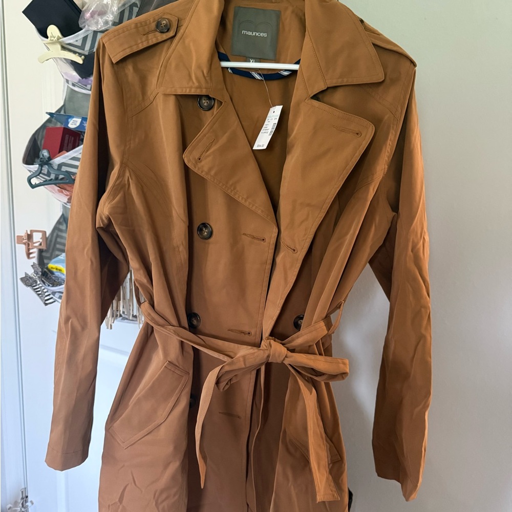 Maurice’s women’s coat. With tags. Never worn. Cute buttons belt and povkets!